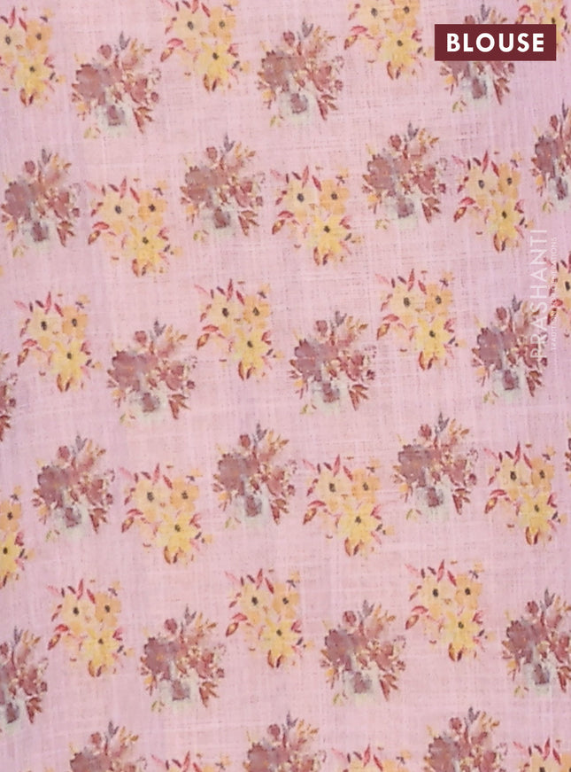 Linen cotton saree pastel pink with floral digital prints and zari woven piping border