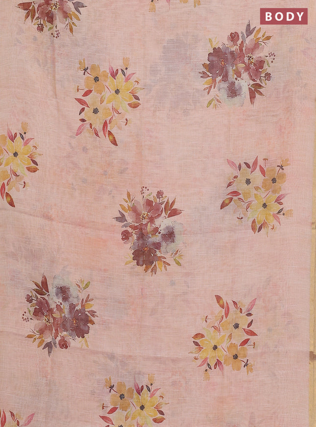 Linen cotton saree peach shade with floral digital prints and zari woven piping border