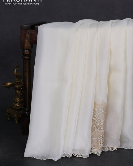 Satin Organza saree off white with plain body and floral design cut work border