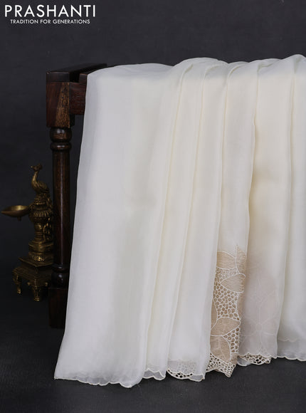 Satin Organza saree off white with plain body and floral design cut work border