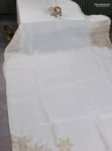 Satin Organza saree off white with plain body and floral design cut work border