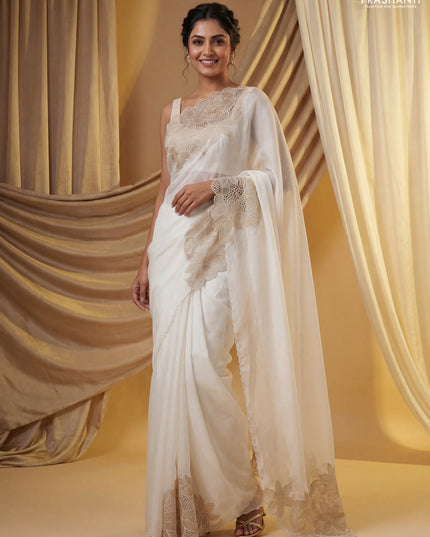 Satin Organza saree off white with plain body and floral design cut work border
