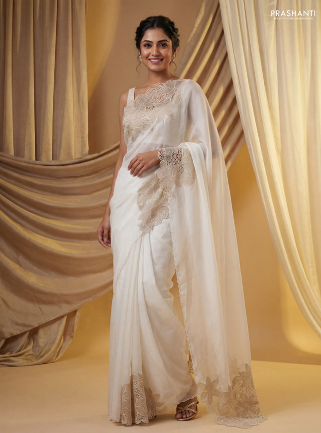 Satin Organza saree off white with plain body and floral design cut work border
