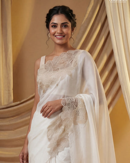Satin Organza saree off white with plain body and floral design cut work border