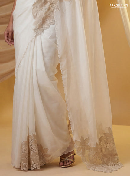 Satin Organza saree off white with plain body and floral design cut work border