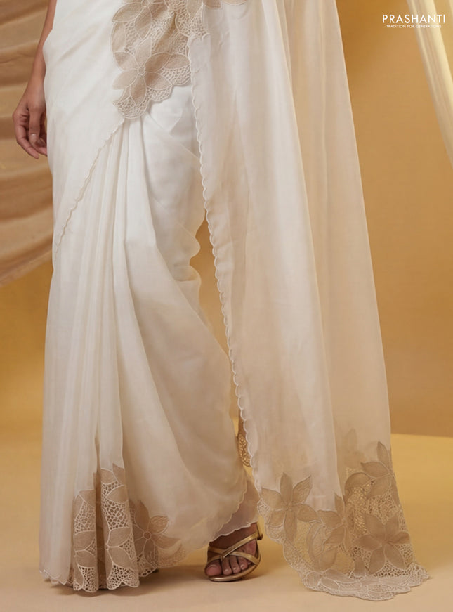 Satin Organza saree off white with plain body and floral design cut work border