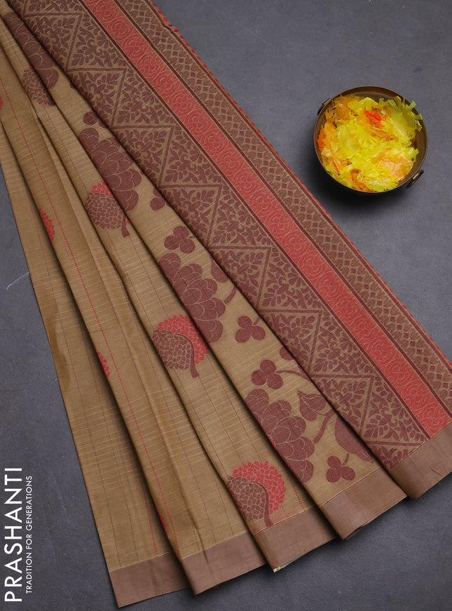 Nithyam cotton saree sandal and pastel brown with allover thread weaves & buttas and simple border