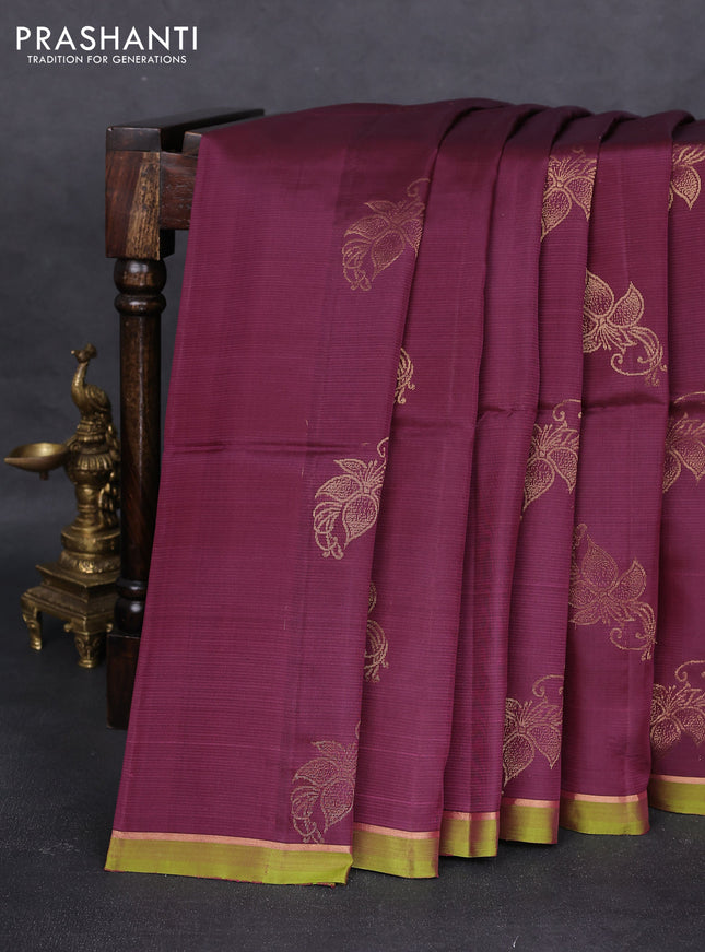 Kanchipuram silk saree wine shade and dual shade of light green with zari woven buttas and simple zari border