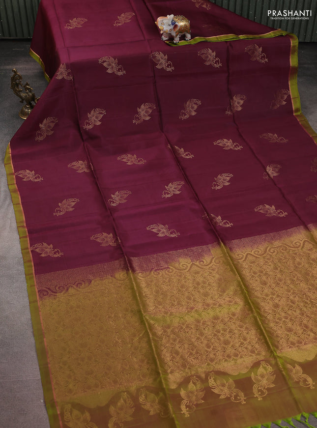 Kanchipuram silk saree wine shade and dual shade of light green with zari woven buttas and simple zari border