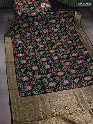 Crepe silk saree black with allover patola mina weaves & sequin work and zari woven border