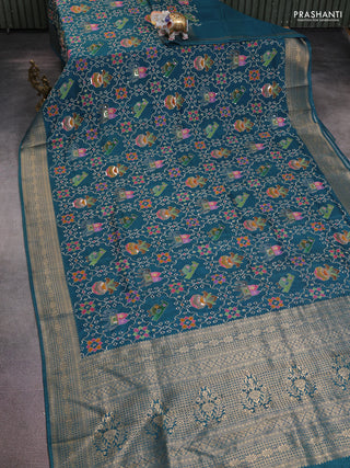 Crepe silk saree peaccock blue with allover mina weaves & sequin work and zari woven border