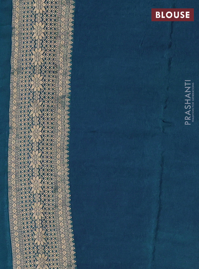 Crepe silk saree peaccock blue with allover mina weaves & sequin work and zari woven border