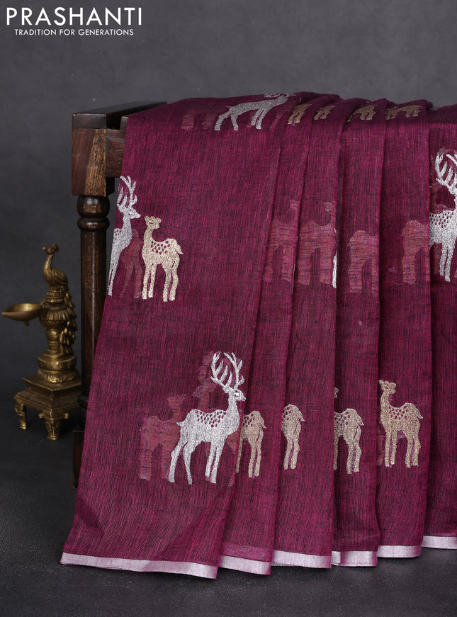 Pure linen saree wine shade with gold & silver zari woven buttas and silver zari woven piping border