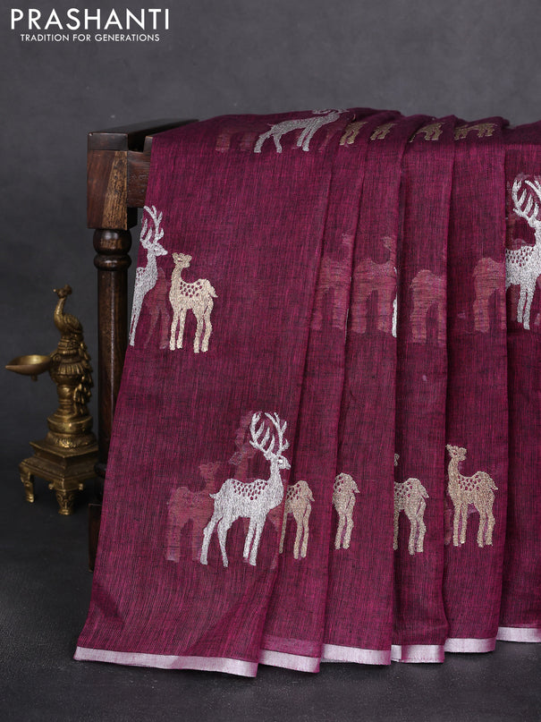 Pure linen saree wine shade with gold & silver zari woven buttas and silver zari woven piping border