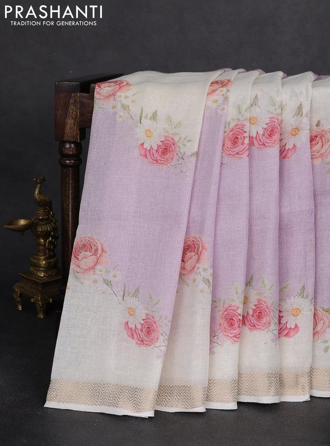 Pure linen saree mild lavender and cream with allover flower prints and zari woven border