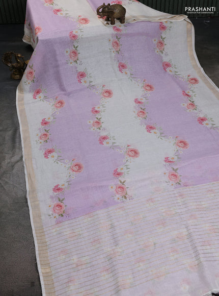 Pure linen saree mild lavender and cream with allover flower prints and zari woven border