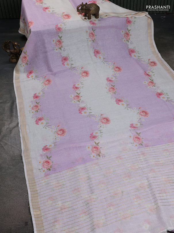 Pure linen saree mild lavender and cream with allover flower prints and zari woven border