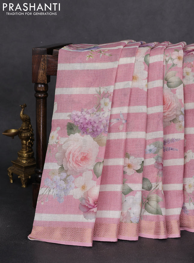 Pure linen saree peach pink and off white with allover flower prints and zari woven border