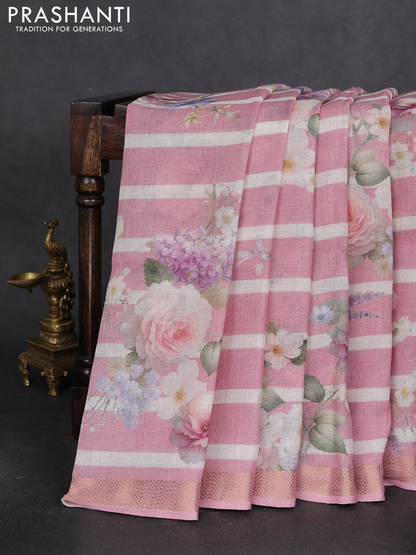 Pure linen saree peach pink and off white with allover flower prints and zari woven border
