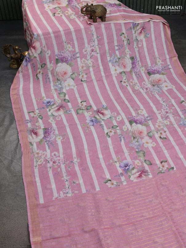 Pure linen saree peach pink and off white with allover flower prints and zari woven border