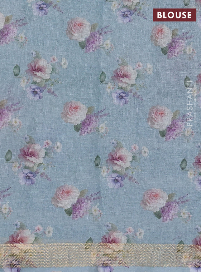 Pure linen saree teal blue and off white with allover flower prints and zari woven border