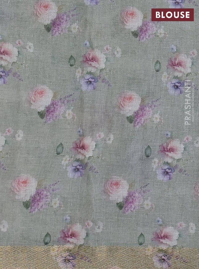 Pure linen saree pista green and off white with allover flower prints and zari woven border