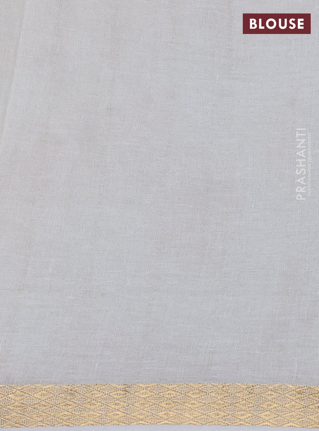 Pure linen saree cream and purple with allover flower prints and zari woven border