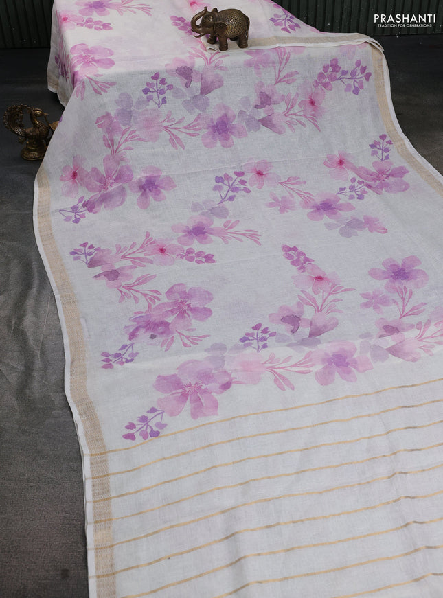 Pure linen saree cream and mild lavender with allover flower prints and zari woven border