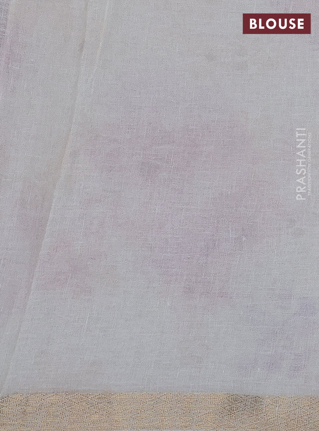 Pure linen saree cream and mild lavender with allover flower prints and zari woven border