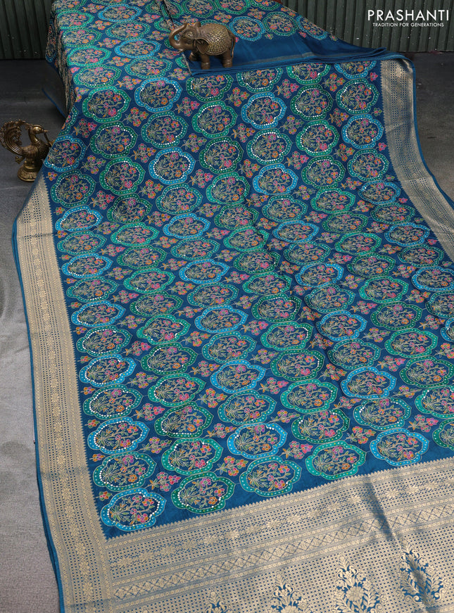 Crepe silk saree peacock blue with allover mina weaves & sequin work and zari woven border