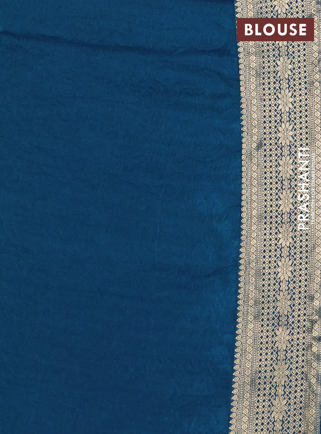 Crepe silk saree peacock blue with allover mina weaves & sequin work and zari woven border