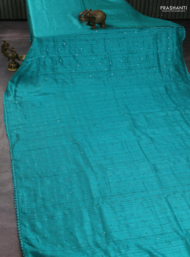 Semi raw silk saree teal blue with allover mirror work and lace work border