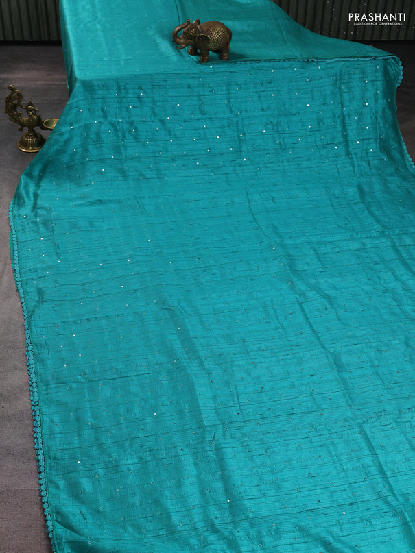Semi raw silk saree teal blue with allover mirror work and lace work border