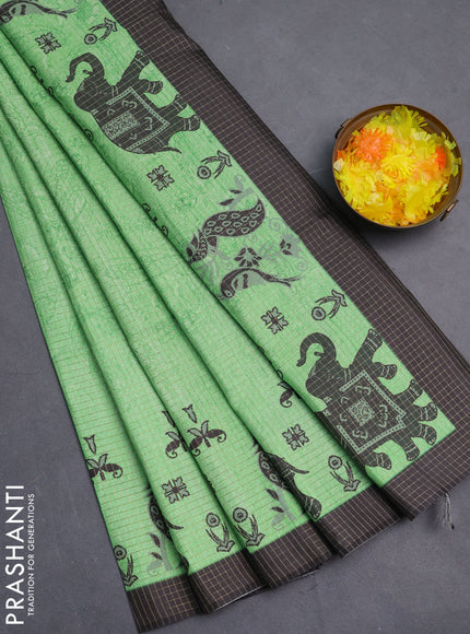 Chappa saree light green and black with allover zari checked pattern and printed pallu