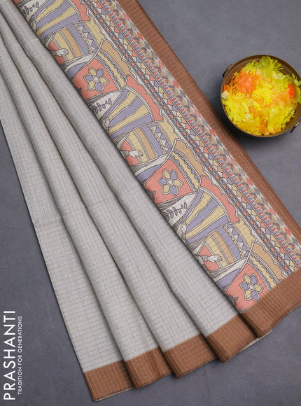 Chappa saree pastel grey and dark mustard with allover zari checked pattern and madhubani printed pallu