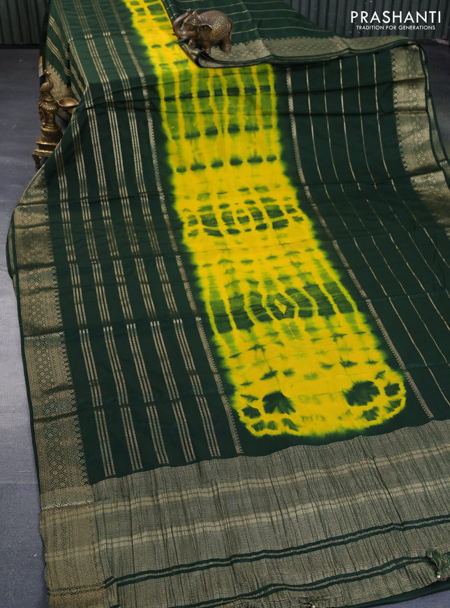 Semi crepe saree yellow and green with allover tie & dye prints and long zari woven border