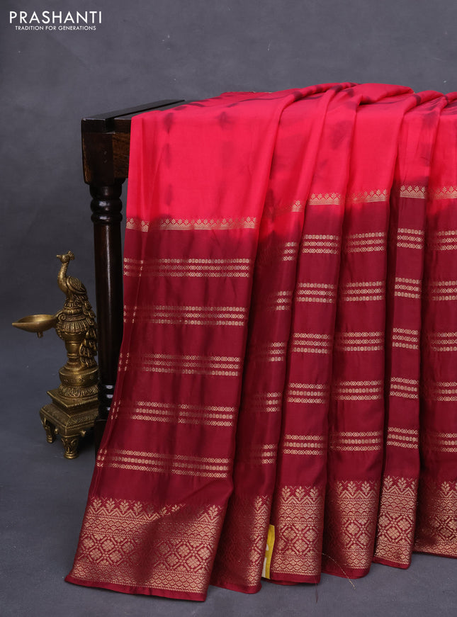 Semi crepe saree reddish pink and maroon with allover tie & dye prints and long zari woven border