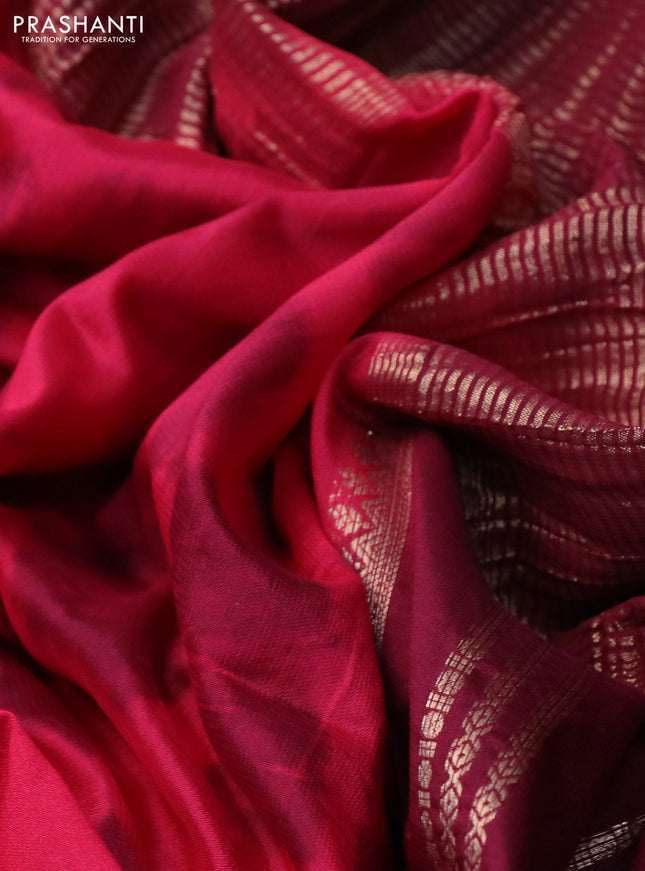Semi crepe saree reddish pink and maroon with allover tie & dye prints and long zari woven border