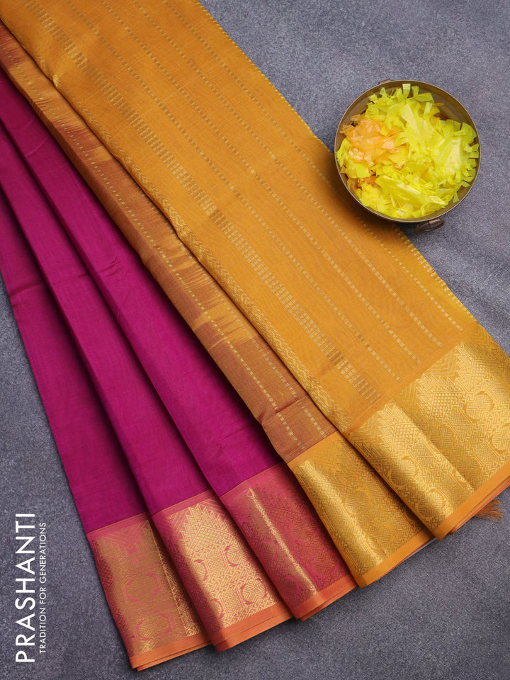 Silk cotton saree magenta pink and mustard yellow with plain body and temple design zari woven border
