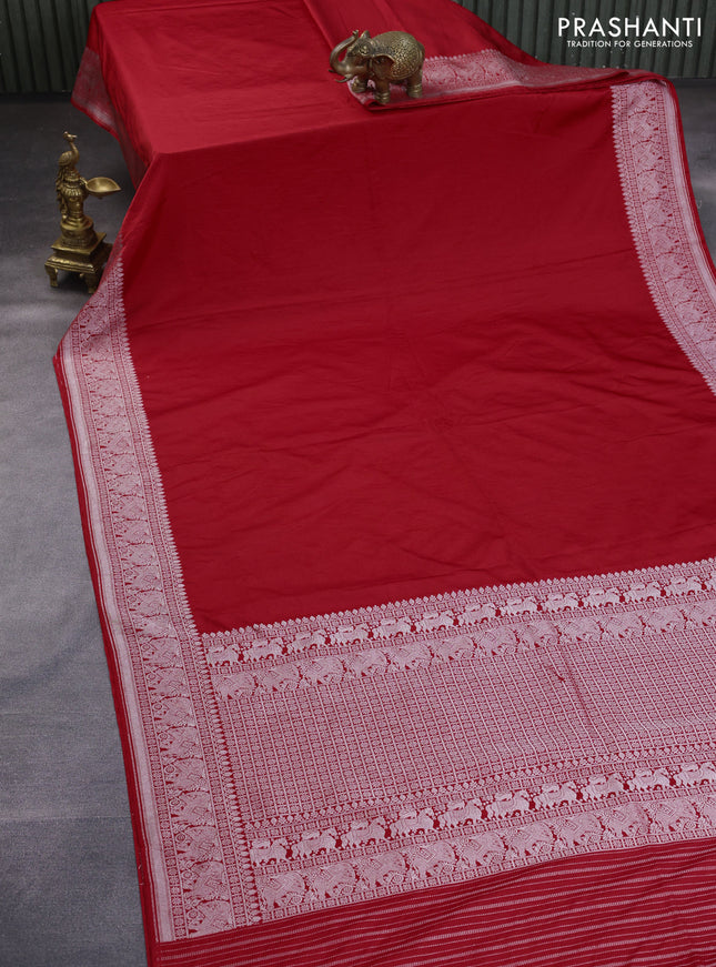 Banarasi crush crepe saree red with plain body and silver zari woven elephant border