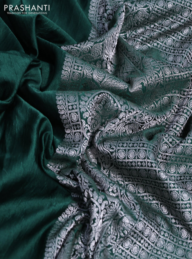 Banarasi crush crepe saree dark green with plain body and silver zari woven border
