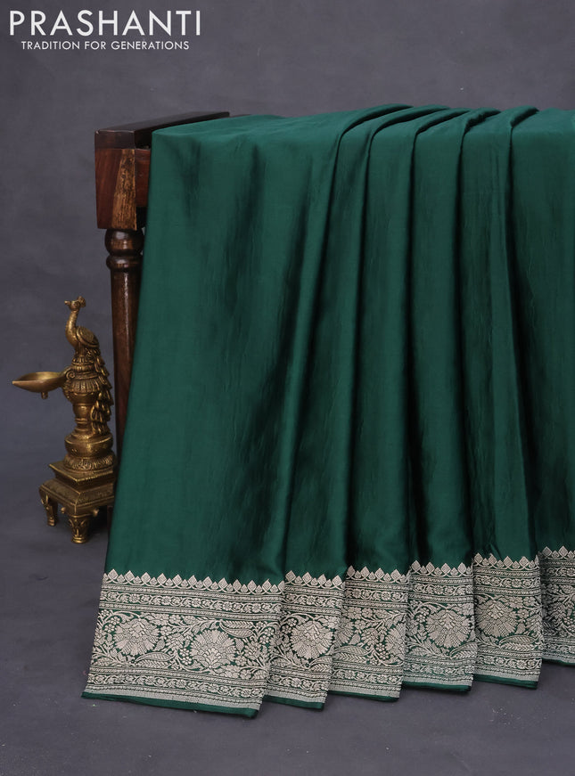 Banarasi crush crepe saree dark green with plain body and zari woven border