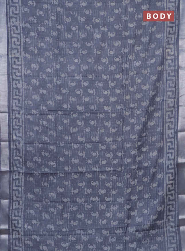 Linen cotton saree grey with allover dabu prints and silver zari woven border