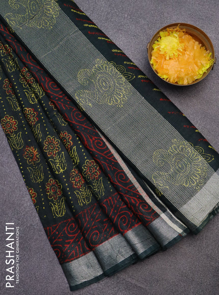 Linen cotton saree bottle green with allover floral butta prints and silver zari woven border