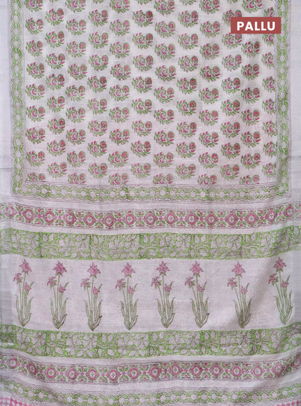 Linen cotton saree off white and green with allover butta prints and silver zari woven border