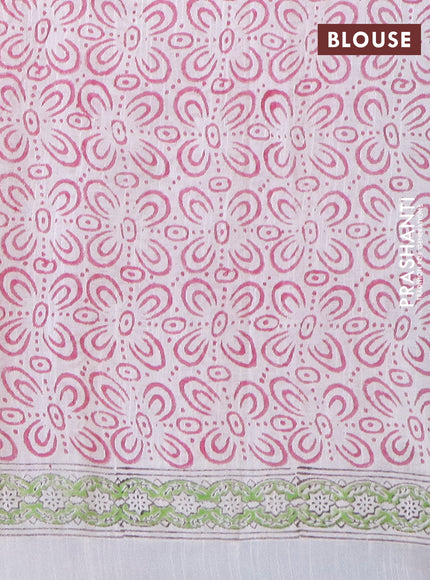 Linen cotton saree off white and green with allover butta prints and silver zari woven border