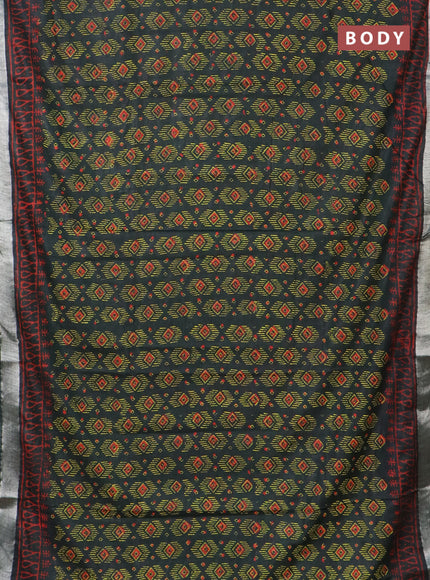 Linen cotton saree bottle green and red with allover butta prints and silver zari woven border