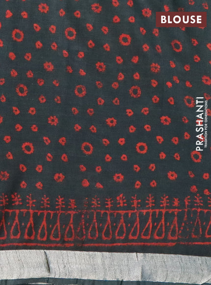 Linen cotton saree bottle green and red with allover butta prints and silver zari woven border