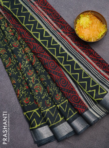 Linen cotton saree bottle green with allover prints and silver zari woven border