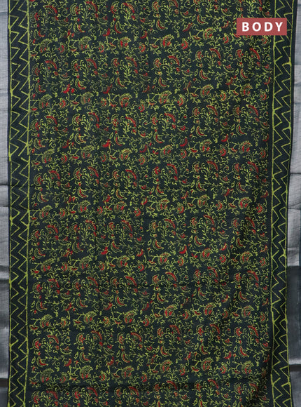 Linen cotton saree bottle green with allover prints and silver zari woven border